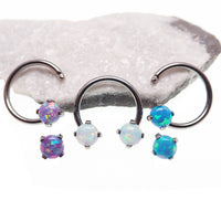 Circular titanium horseshoe body jewelry with 16g top holes and opal accents, designed by Body Clickers.