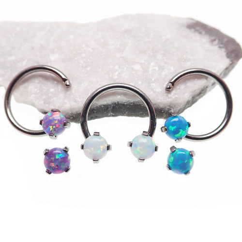 Circular titanium horseshoe body jewelry with 16g top holes and opal accents, designed by Body Clickers.