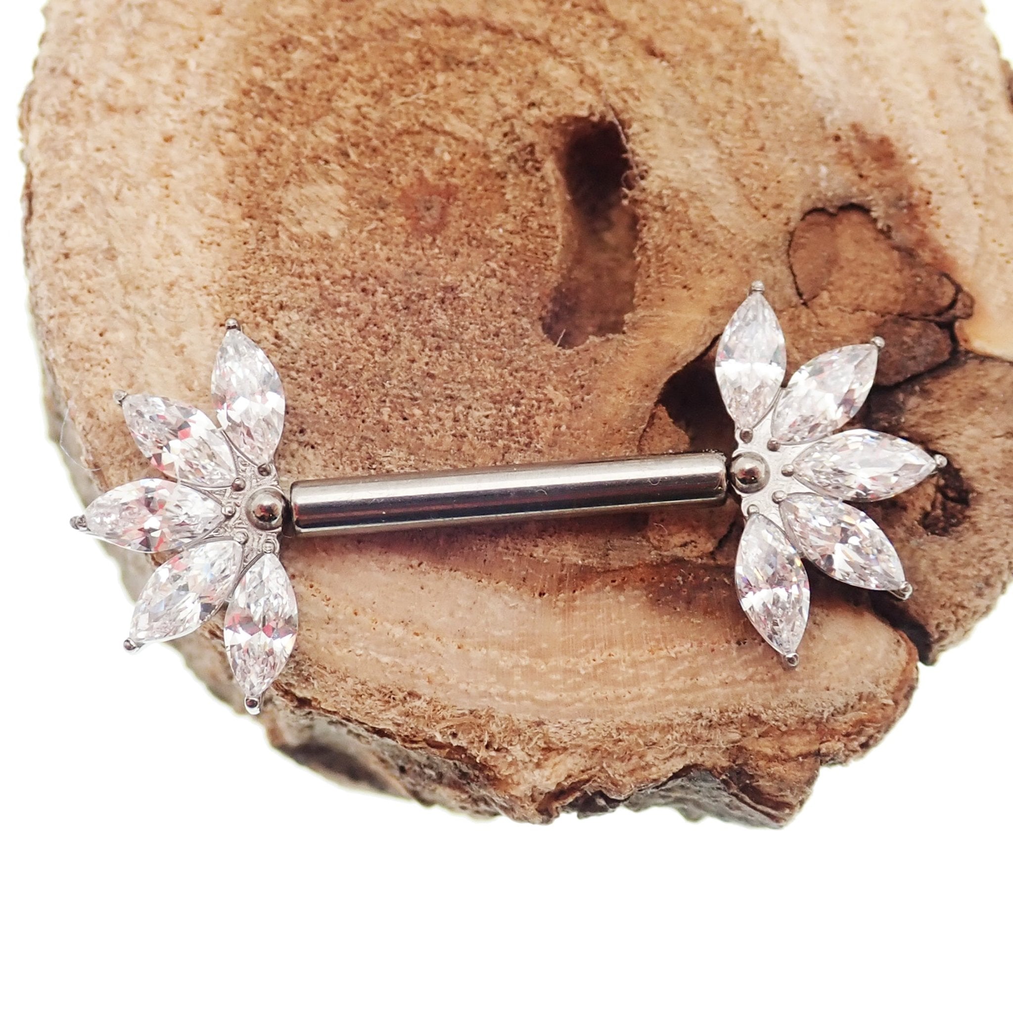 Clear CZ flower titanium nipple barbell in 16g and 14g with a flower design, body jewelry by Body Clickers.