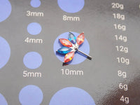 Orange and blue CZ flower titanium nipple bar in 12g, 14g, 16g body jewelry by Body Clickers, featuring colorful floral design.