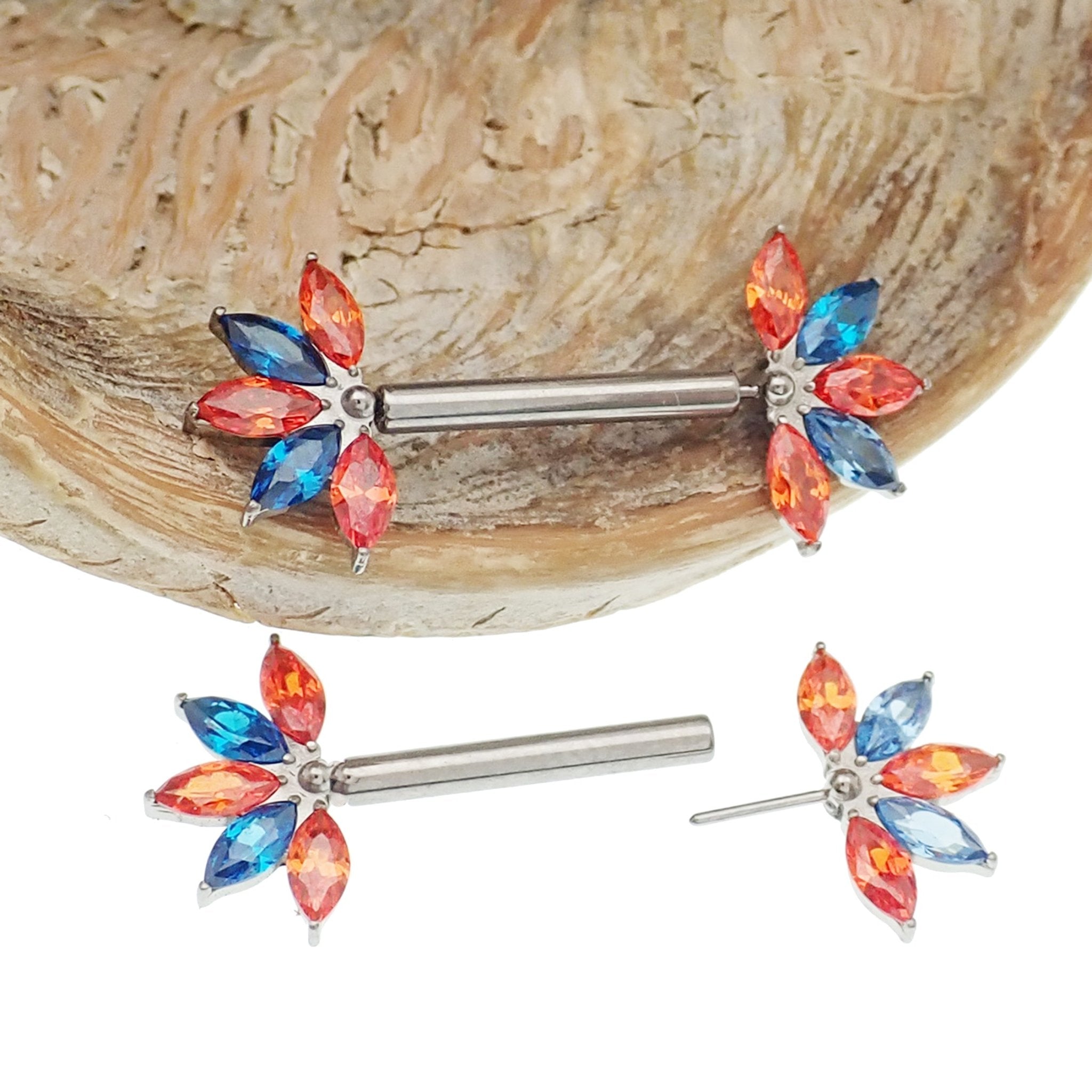 Orange and blue CZ flower titanium nipple bar jewelry by Body Clickers in 12g, 14g, and 16g gauges.