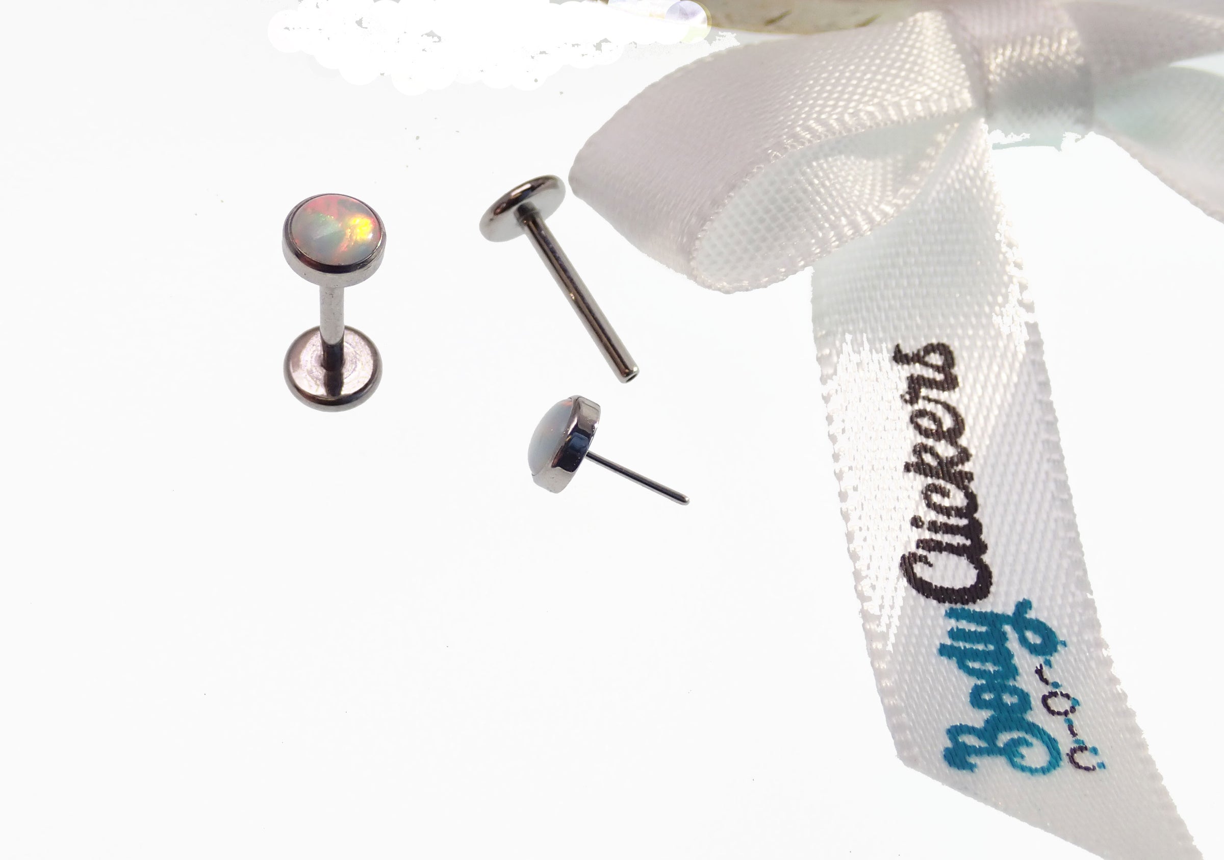 White Opal push fit flatback body jewelry in 16G with 6mm and 4mm sizes, by Body Clickers Body Jewelry.