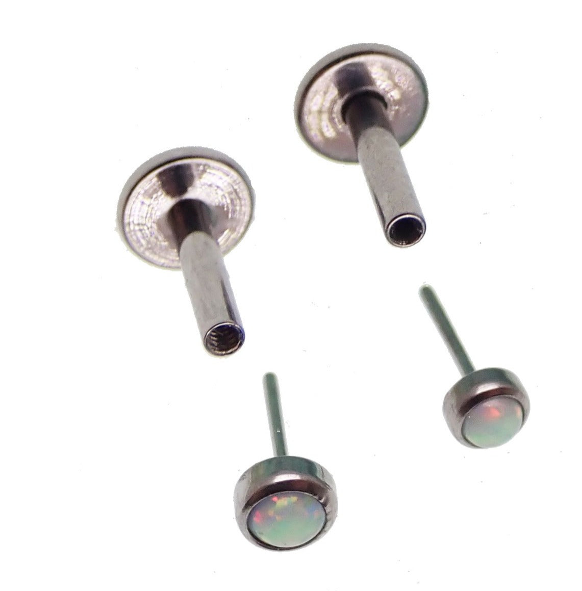 White Opal push fit flatback body jewelry in 16g with 6mm and 4mm sizes, featuring a sleek, smooth design from Body Clickers.
