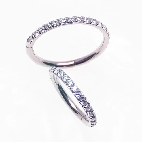 Titanium CZ clicker hoop body jewelry in 16g, 18g, 20g with 6mm diameter, from Body Clickers, featuring sparkling cubic zirconia stones.