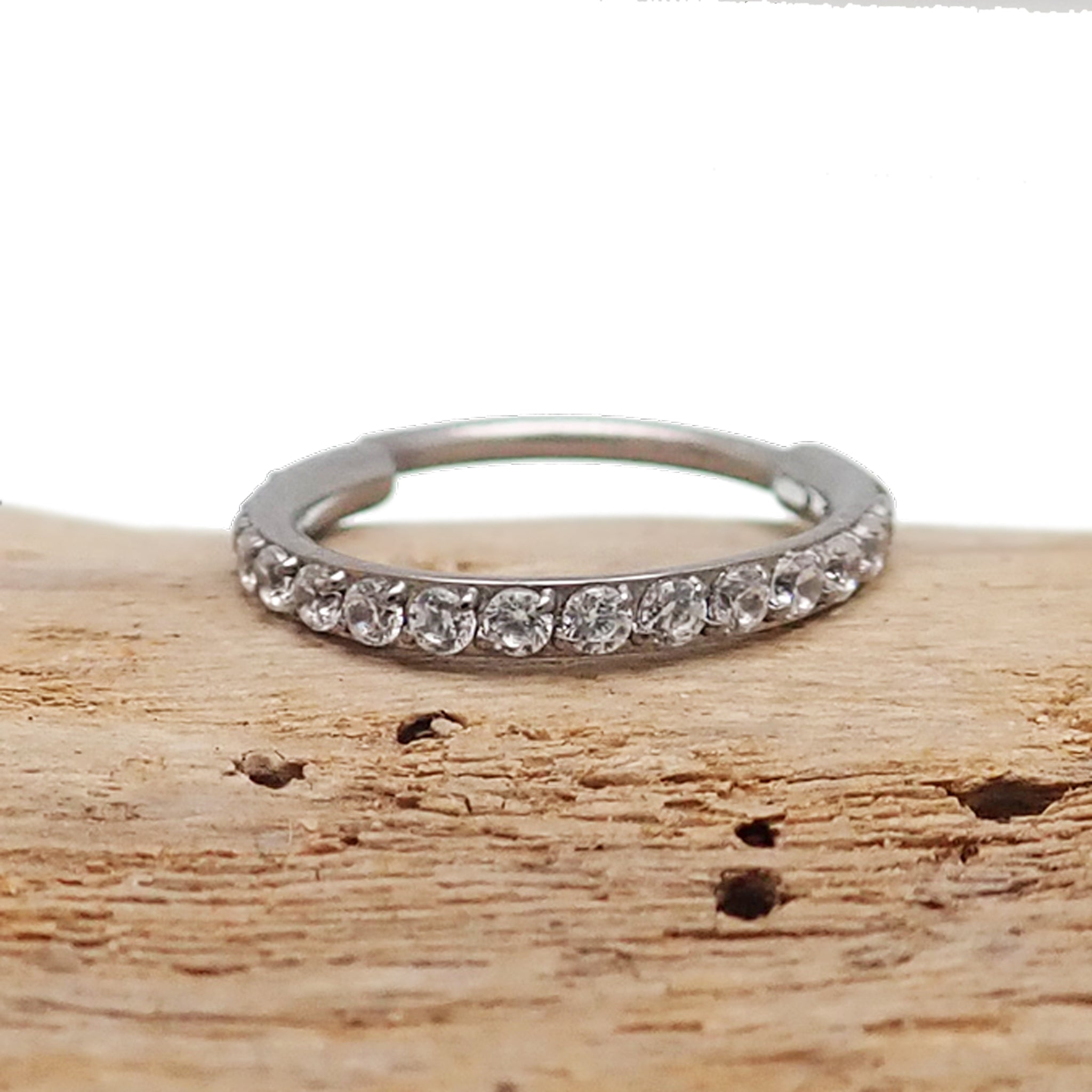 Titanium CZ clicker hoop body jewelry in 16g, 18g, or 20g with a 6mm diameter, by Body Clickers.