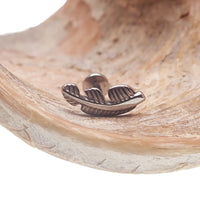 Feather titanium flatback labret body jewelry in 18g, 16g, 14g, featuring a sleek feather design and secure flatback for comfortable wear.