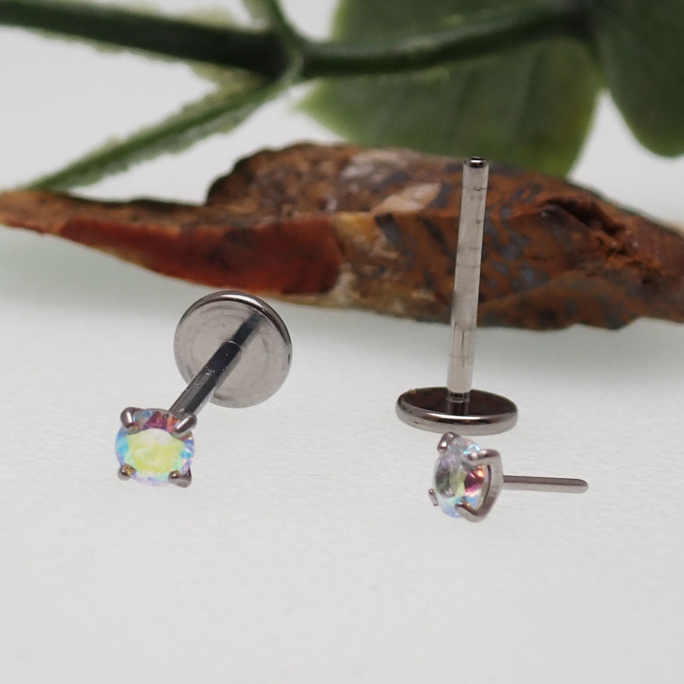 Rainbow AB Push Fit Titanium Flatback body jewelry in 16g and 18g, featuring colorful, flatback design by Body Clickers.
