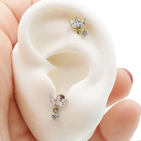 Small flower dangle titanium body jewelry with flatback, available in 14g, 16g, and 18g gauges, by Body Clickers.