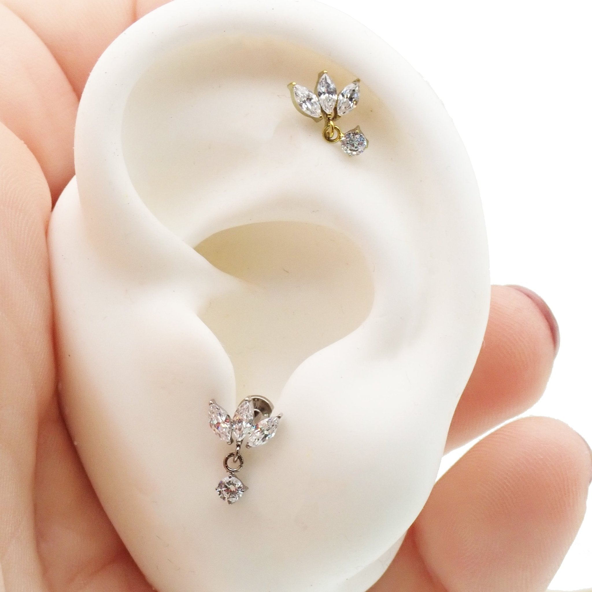Small flower dangle titanium body jewelry with flatback, available in 14g, 16g, and 18g gauges, by Body Clickers.