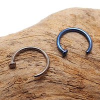 Titanium nose hoop body jewelry in 8mm and 10mm sizes, 18g and 20g gauges, with a sleek, circular design.