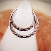 Polished crescent titanium clicker body jewelry in 18g and 16g with an 8mm opening, designed by Body Clickers for body piercing.