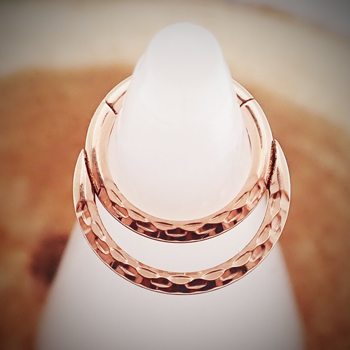 Rose gold PVD crescent titanium clicker body jewelry in 18g and 16g gauges with 8mm size, featuring a stylish crescent design.