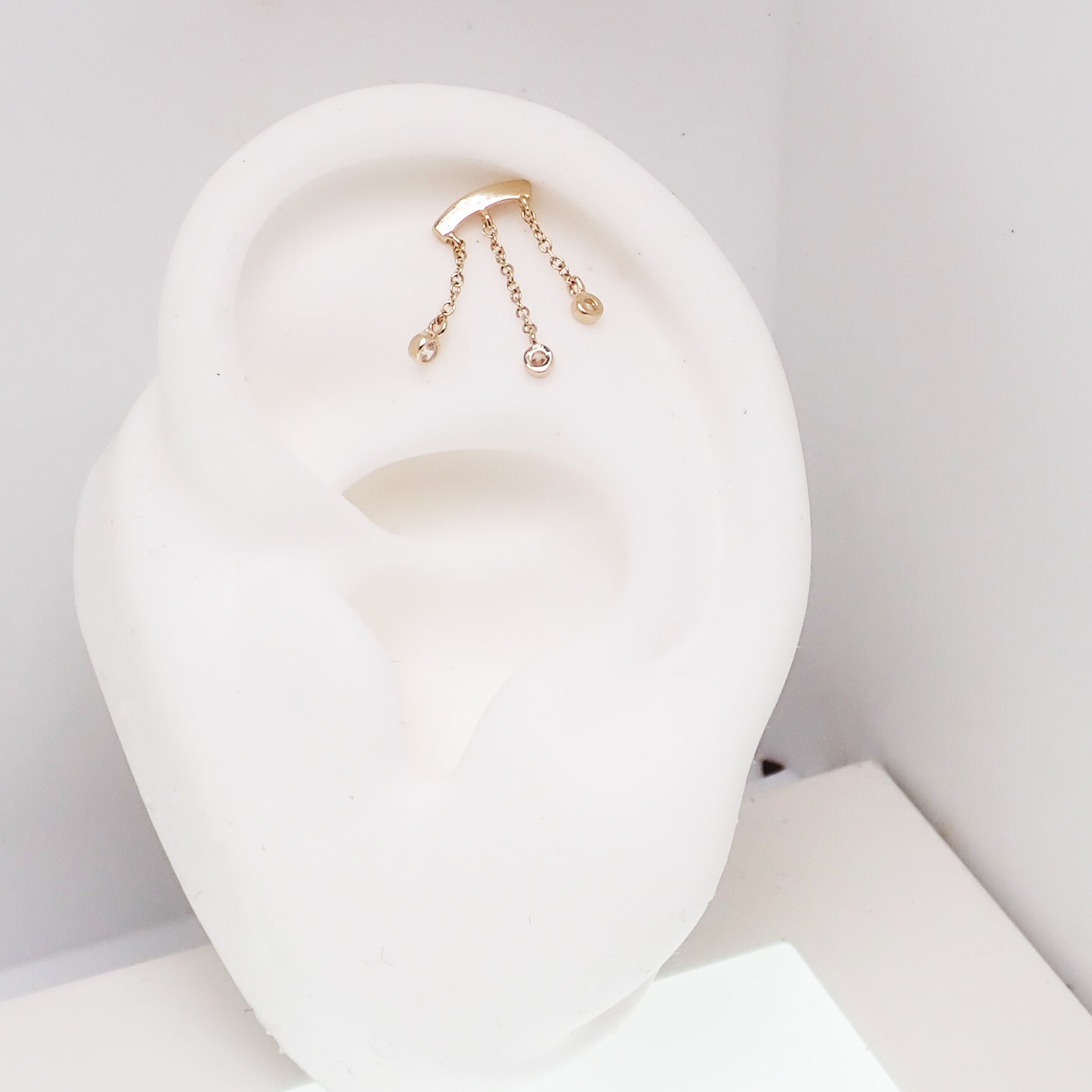 14k gold dangle body jewelry by Body Clickers in 20g, 18g, 16g, 14g sizes with push-fit flatback design.