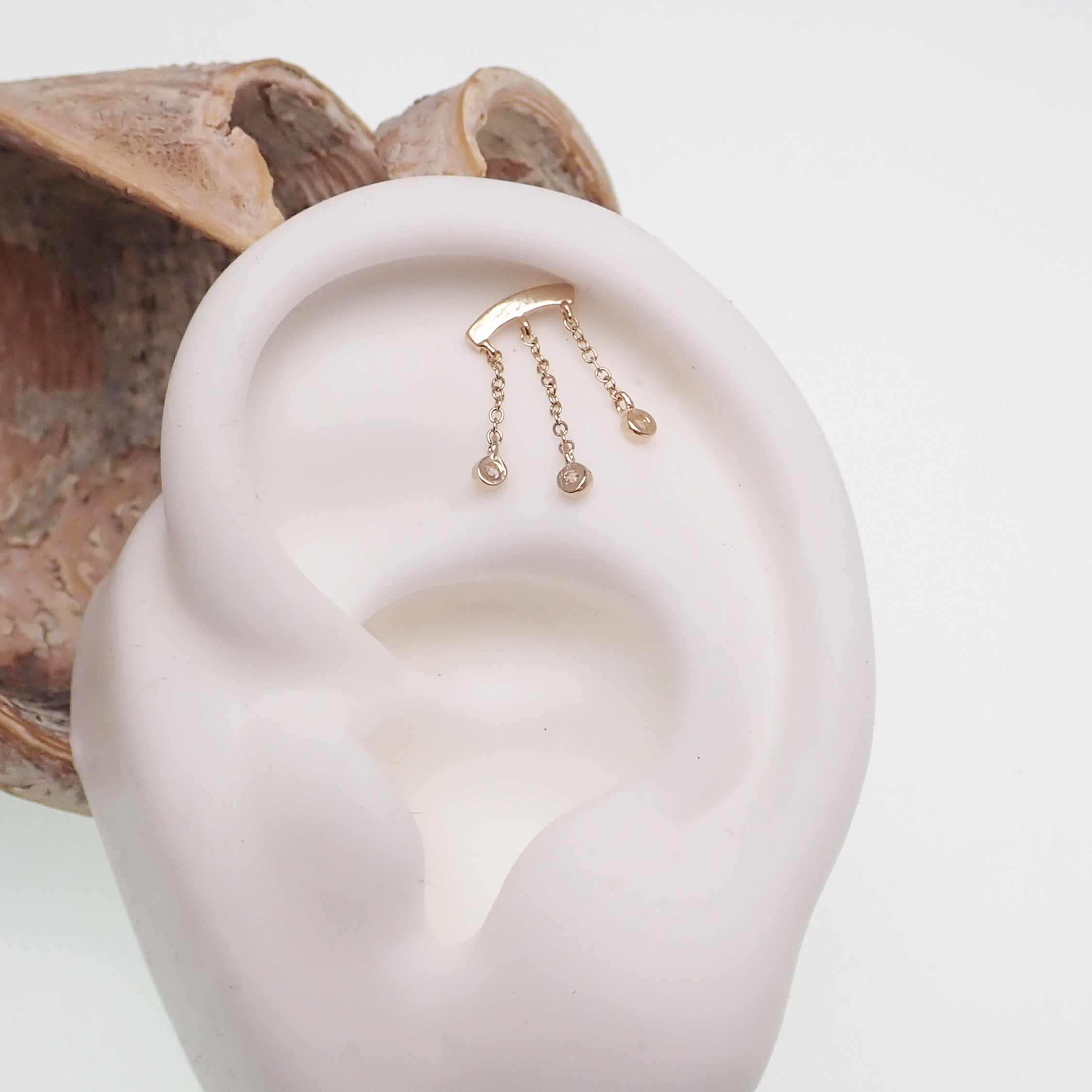 14k gold dangle body jewelry with push fit flatback in 14g, 16g, 18g, and 20g sizes by Body Clickers
