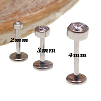 Clear CZ titanium push fit flat back body jewelry in 14g, 16g, 18g, and 20g sizes, with 6mm length and 2mm CZ stones.