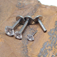 Push Fit Crystal flat back labret body jewelry by Body Clickers in 3, 4, and 5mm sizes, featuring a crystal accent and flat back design.