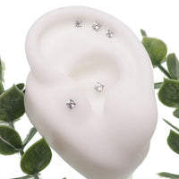Push Fit Crystal flat back labret body jewelry by Body Clickers with 3-5mm clear crystal and 20g size, 6mm post length.