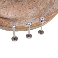 Push Fit Crystal flat back labret body jewelry by Body Clickers, available in 3, 4, and 5mm sizes with clear crystal accents.
