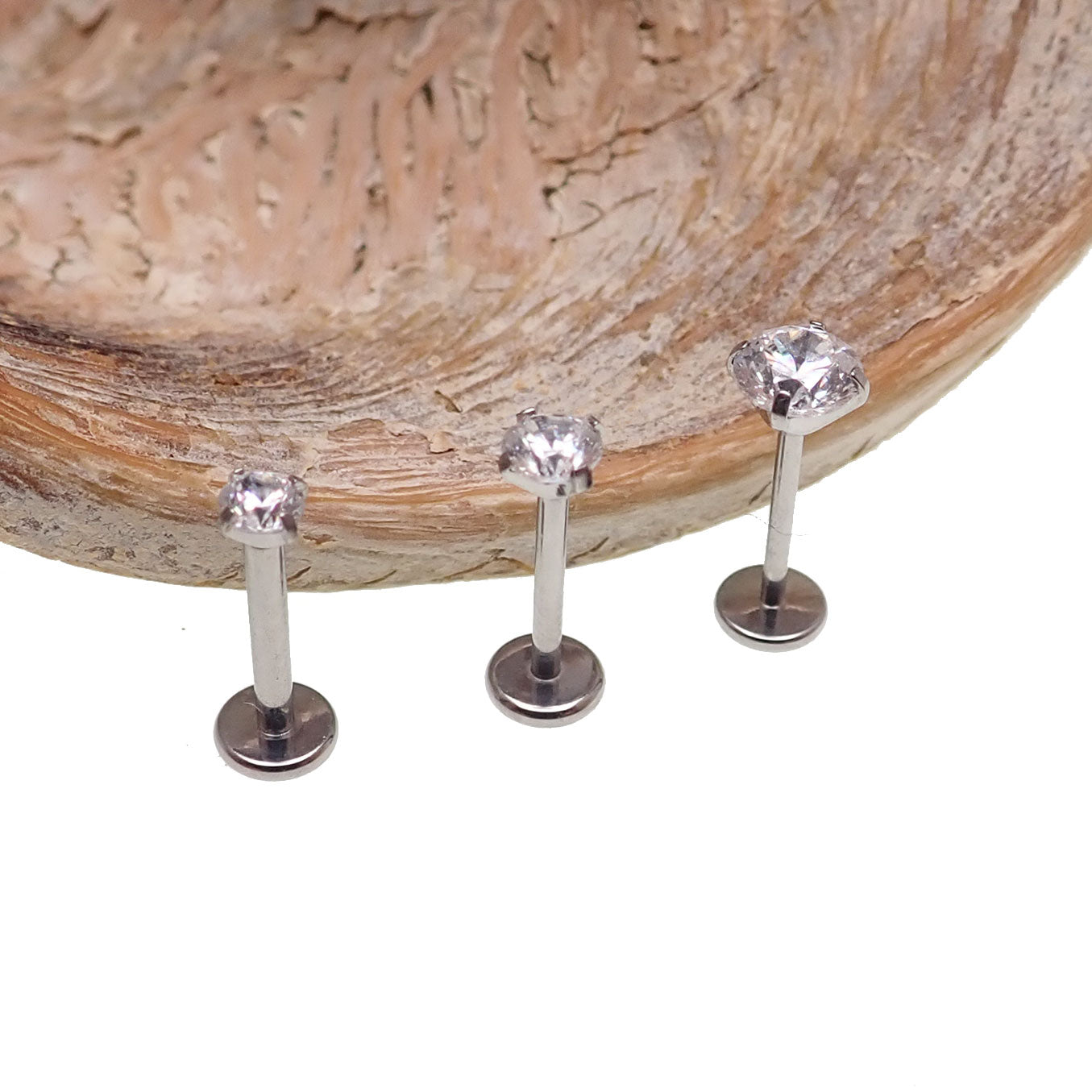Push Fit Crystal flat back labret body jewelry by Body Clickers, available in 3, 4, and 5mm sizes with clear crystal accents.