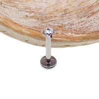 Push Fit Crystal flat back labret body jewelry in 3, 4, or 5mm with clear crystals and a 20 gauge size, by Body Clickers.