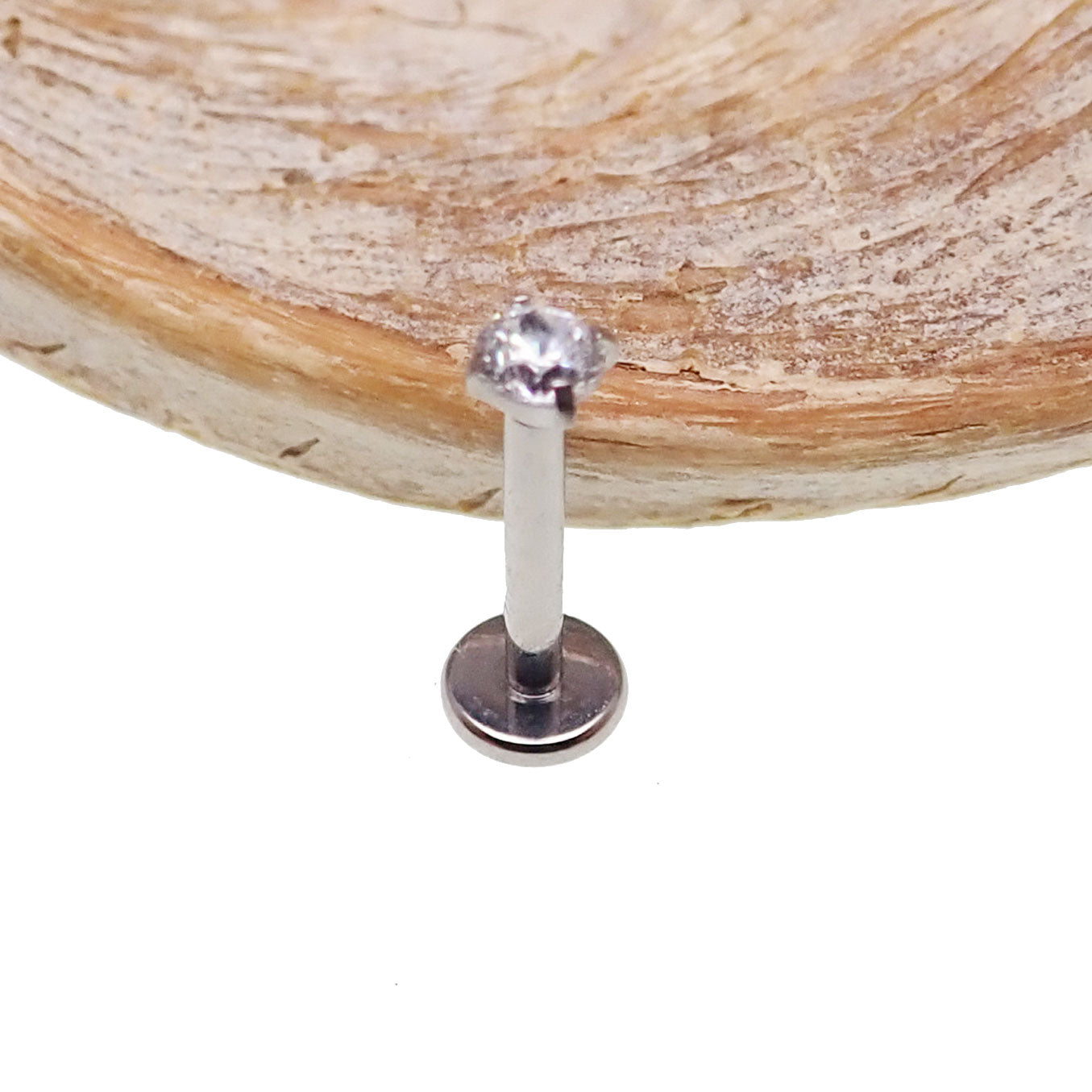 Push Fit Crystal flat back labret body jewelry in 3, 4, or 5mm with clear crystals and a 20 gauge size, by Body Clickers.