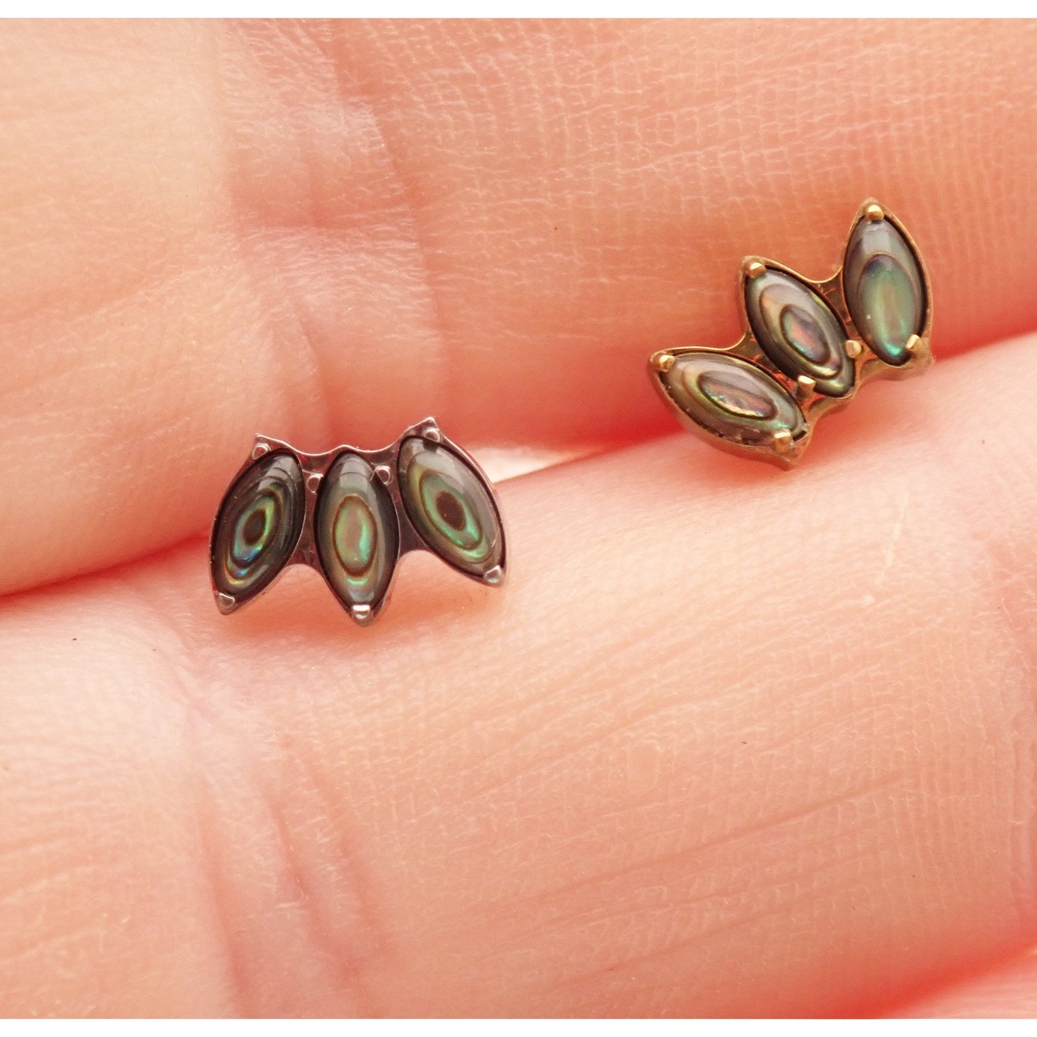 Alabone Shell Lotus push fit titanium body jewelry in 14g to 20g with a flatback design, threaded and threadless options.