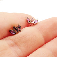 Amethyst lotus push fit flatback titanium body jewelry in 14g, 16g, 18g, 20g with purple gemstone and floral design.