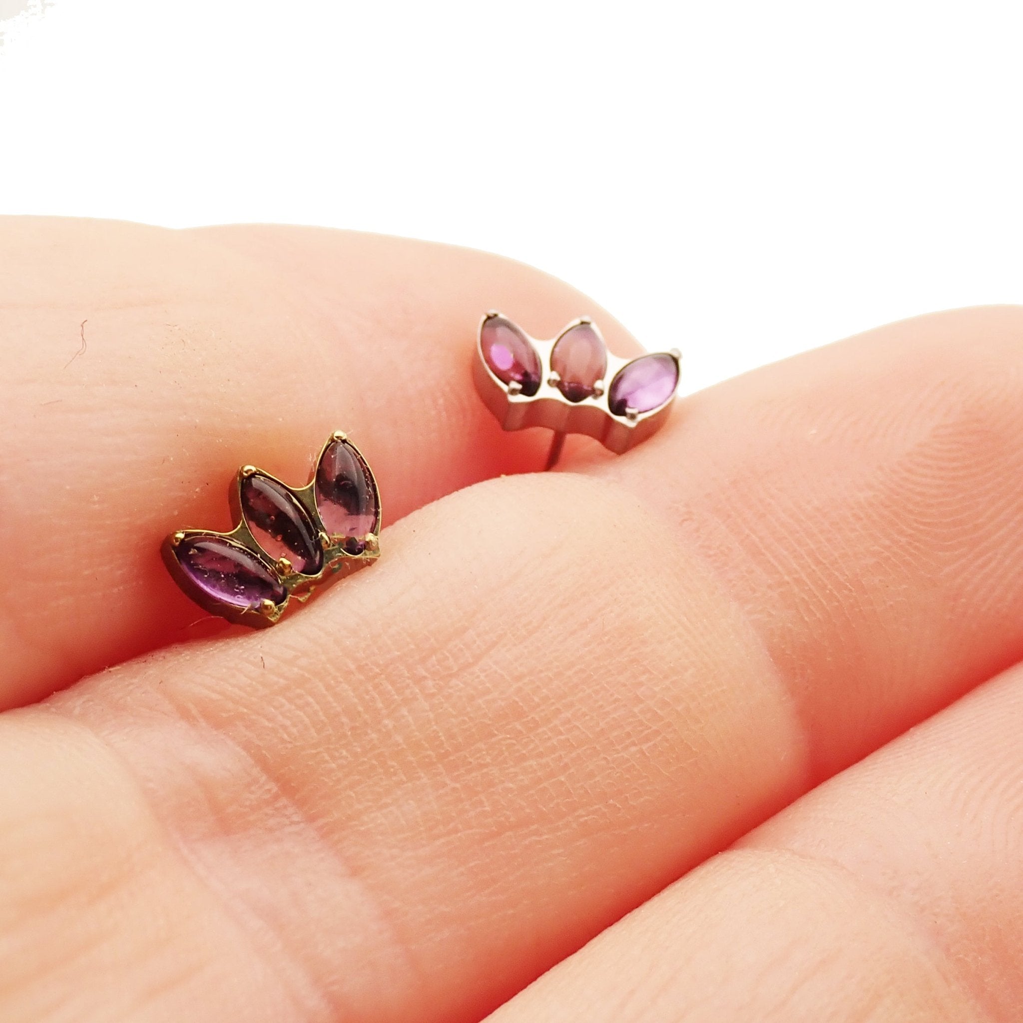 Amethyst lotus push fit flatback titanium body jewelry in 14g, 16g, 18g, 20g with purple gemstone and floral design.