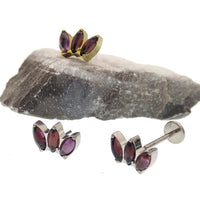 Amethyst lotus push fit flatback titanium body jewelry in 14g, 16g, 18g, and 20g with a floral lotus design.
