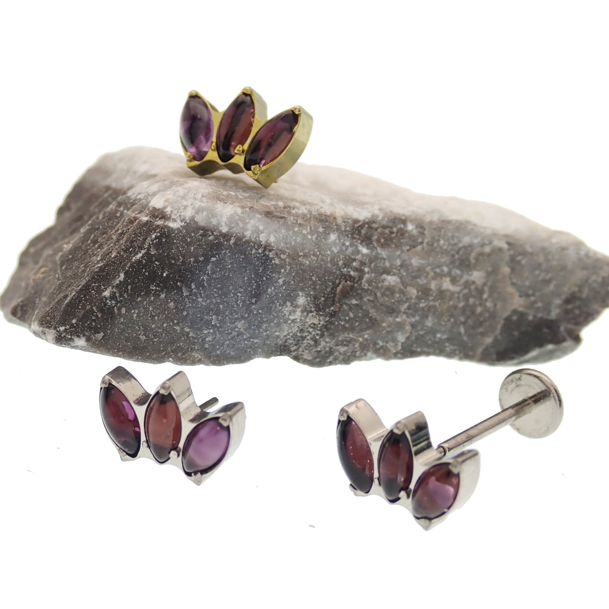 Amethyst lotus push fit flatback titanium body jewelry in 14g, 16g, 18g, and 20g with a floral lotus design.