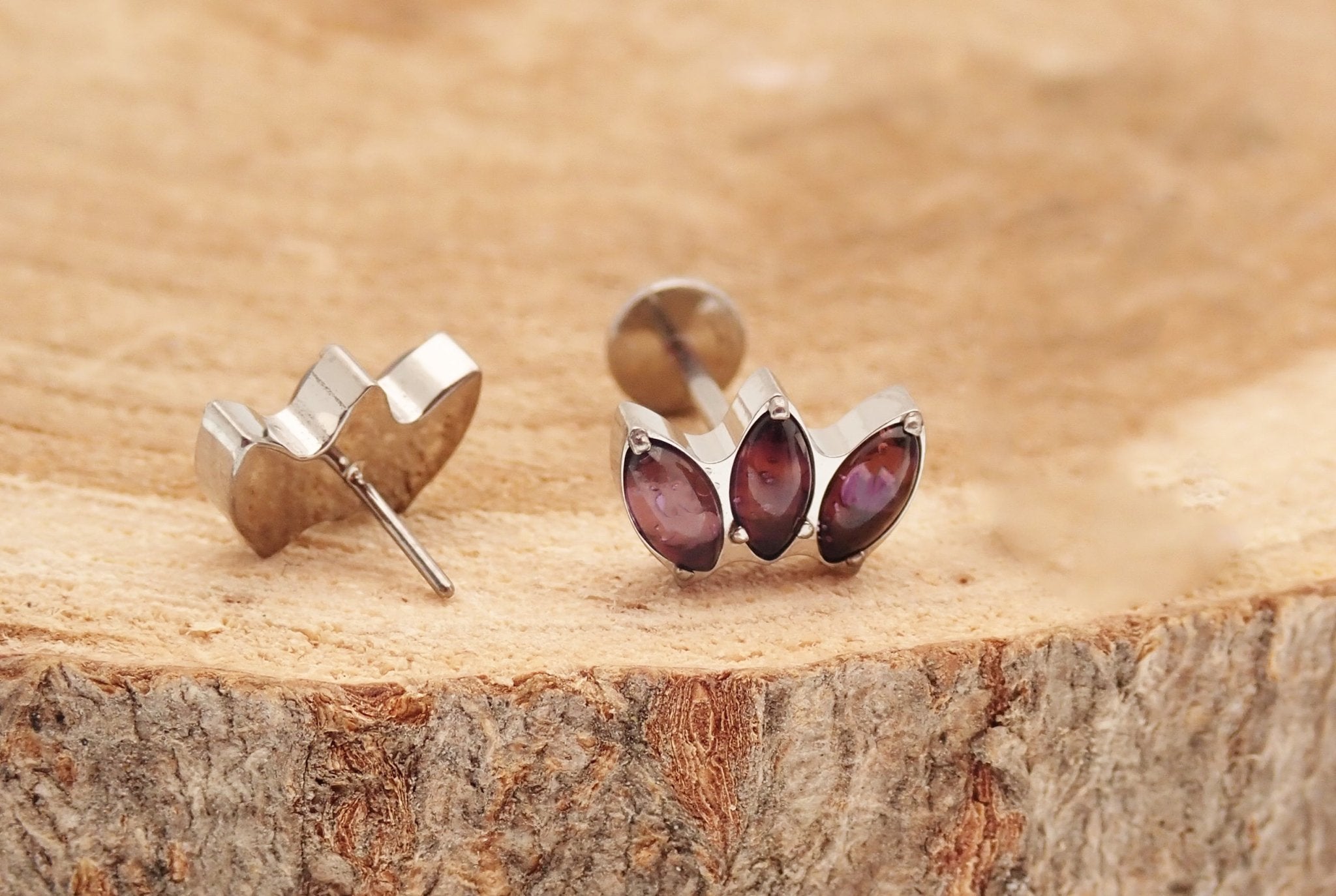 Amethyst Lotus push fit flatback titanium body jewelry in 14g to 20g sizes, featuring a lotus design and secure fit.