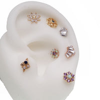 Sapphire blue cluster body jewelry in 14k gold push fit, 20g gauge and 6mm size, by Body Clickers.