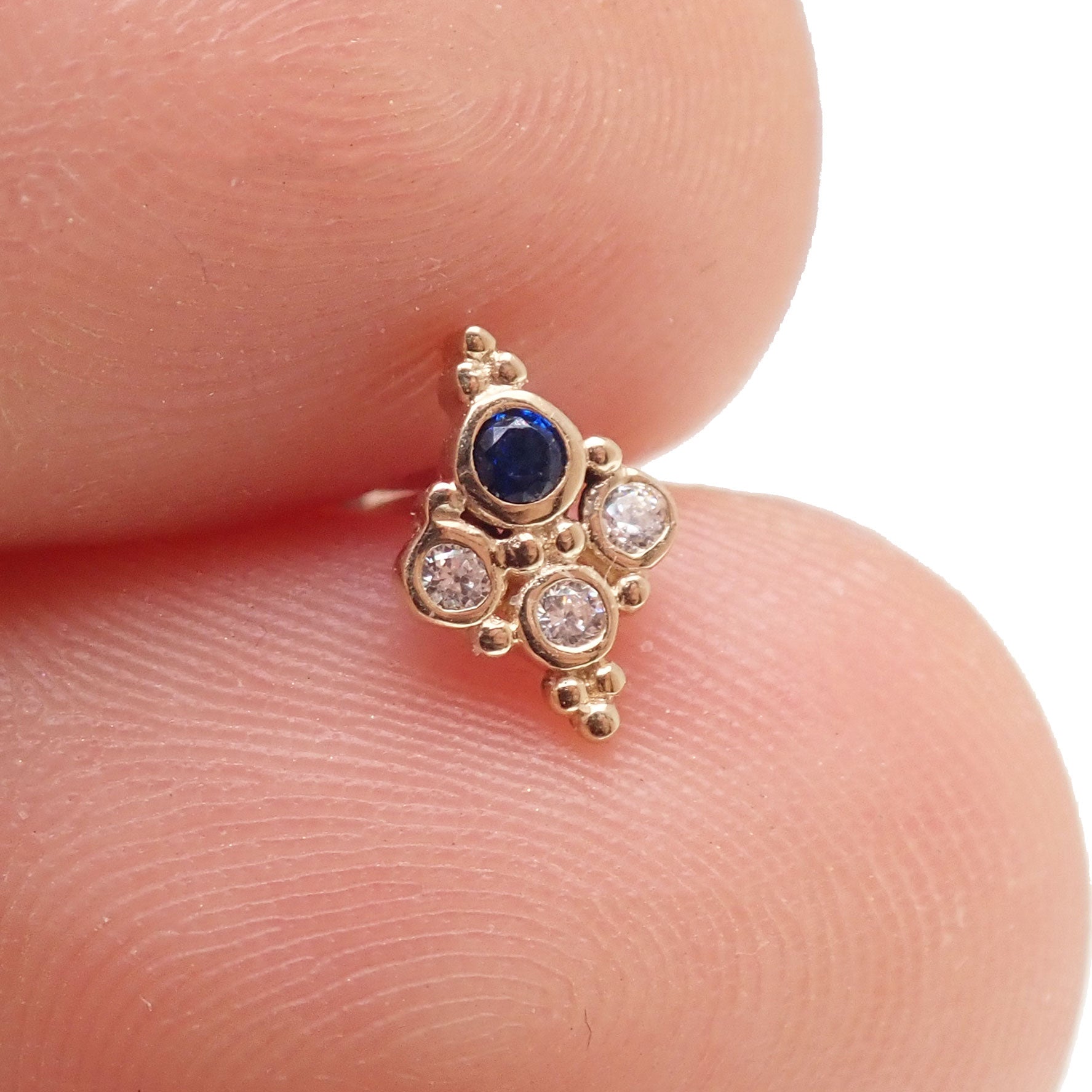 Sapphire blue cluster 14k gold push fit body jewelry by Body Clickers, featuring a 20g gauge and 6mm gemstone cluster.