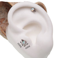 White opal beaded flat back body jewelry by Body Clickers in 14g to 20g sizes, featuring a sleek beaded design with 6mm stones.