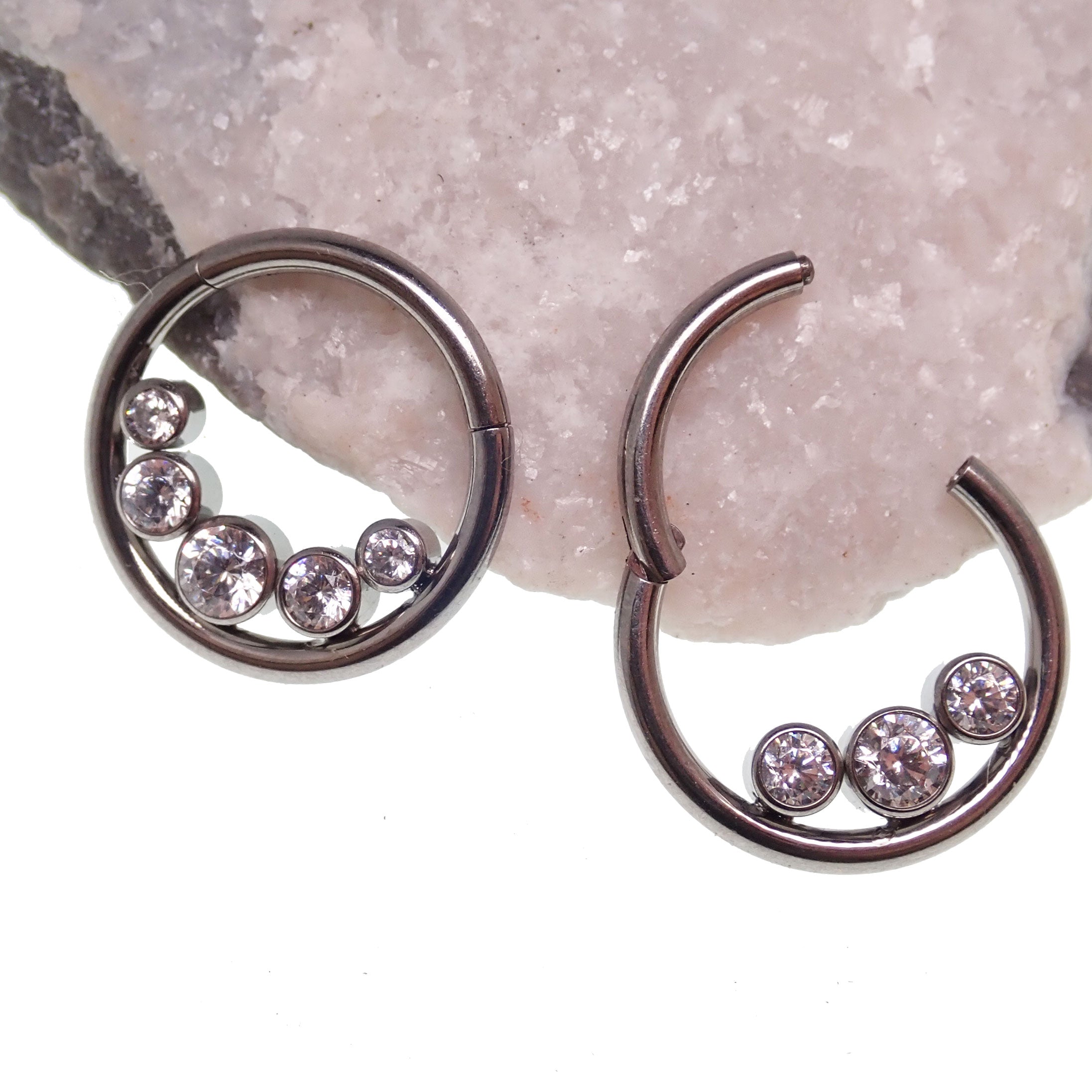 Inverted zircon crystal clicker body jewelry in 16g with three-stone design by Body Clickers