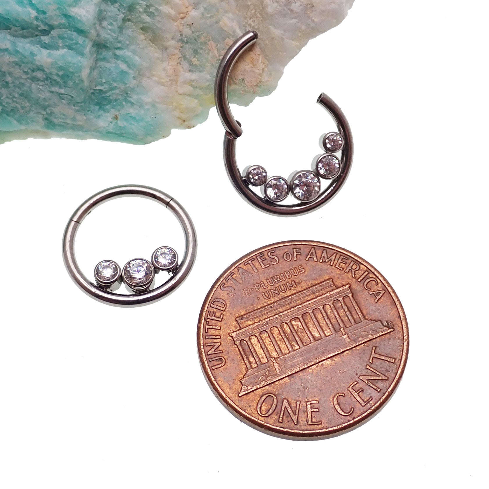 Inverted Zircon Crystal Clicker 16g body jewelry by Body Clickers with a three-stone design and sparkling zircon crystals.