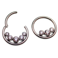 Inverted zircon crystal clicker body jewelry in 16g with three-stone design by Body Clickers, showcasing sparkling crystals and sleek metal.