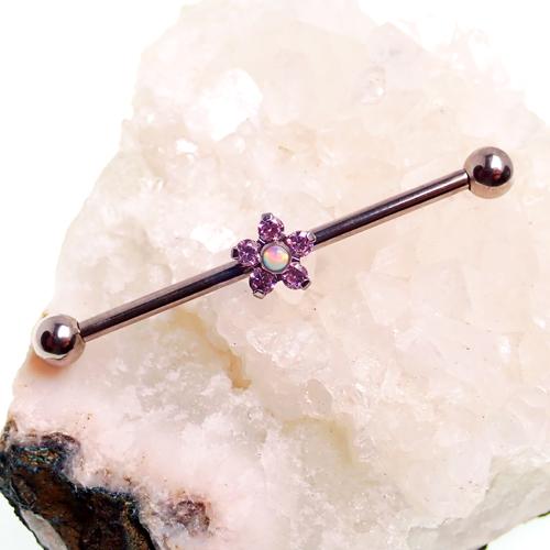 Titanium drilled industrial body jewelry with flower design, 14g, by Body Clickers, shown with a 32mm length.