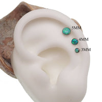 Implant titanium Kiwi green opal flatback piercing by Body Clickers, 3mm internally threaded body jewelry for body piercing.
