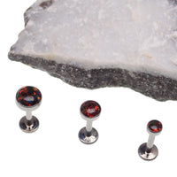 Black cherry opal flat back body jewelry piercing in 14g, 16g, or 18g by Body Clickers, shown with the gemstone and metal setting.