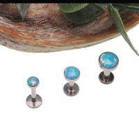 Blue mint opal flat back body jewelry piercing by Body Clickers in 14g, 16g, or 18g with sleek labret style.