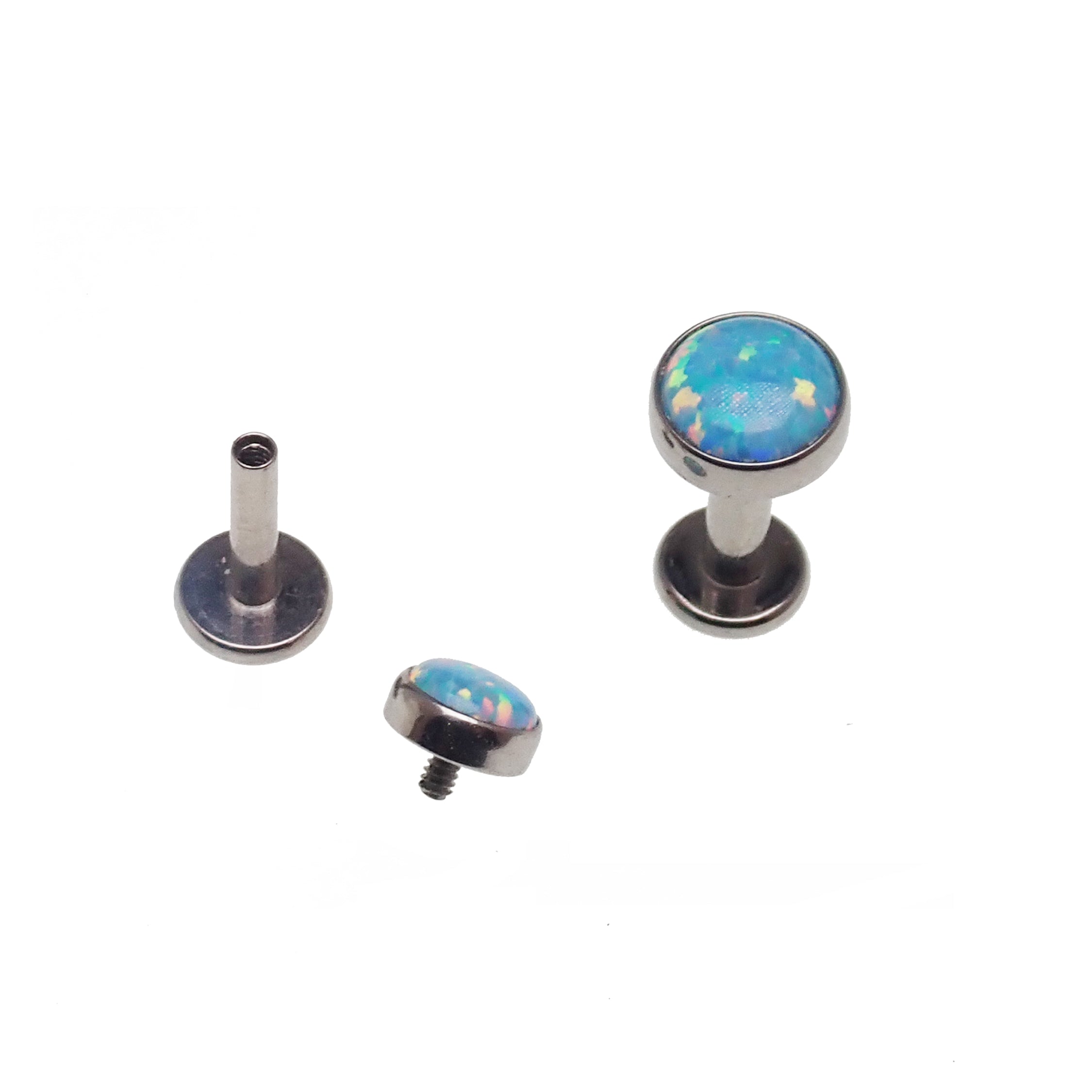 Blue mint opal flat back body jewelry piercing by Body Clickers in 14g, 16g, or 18g with a vibrant gemstone design.