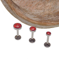Fire Opal flat back body piercing by Body Clickers, available in 14g, 16g, 18g, featuring a 3mm or 6mm stone on body jewelry