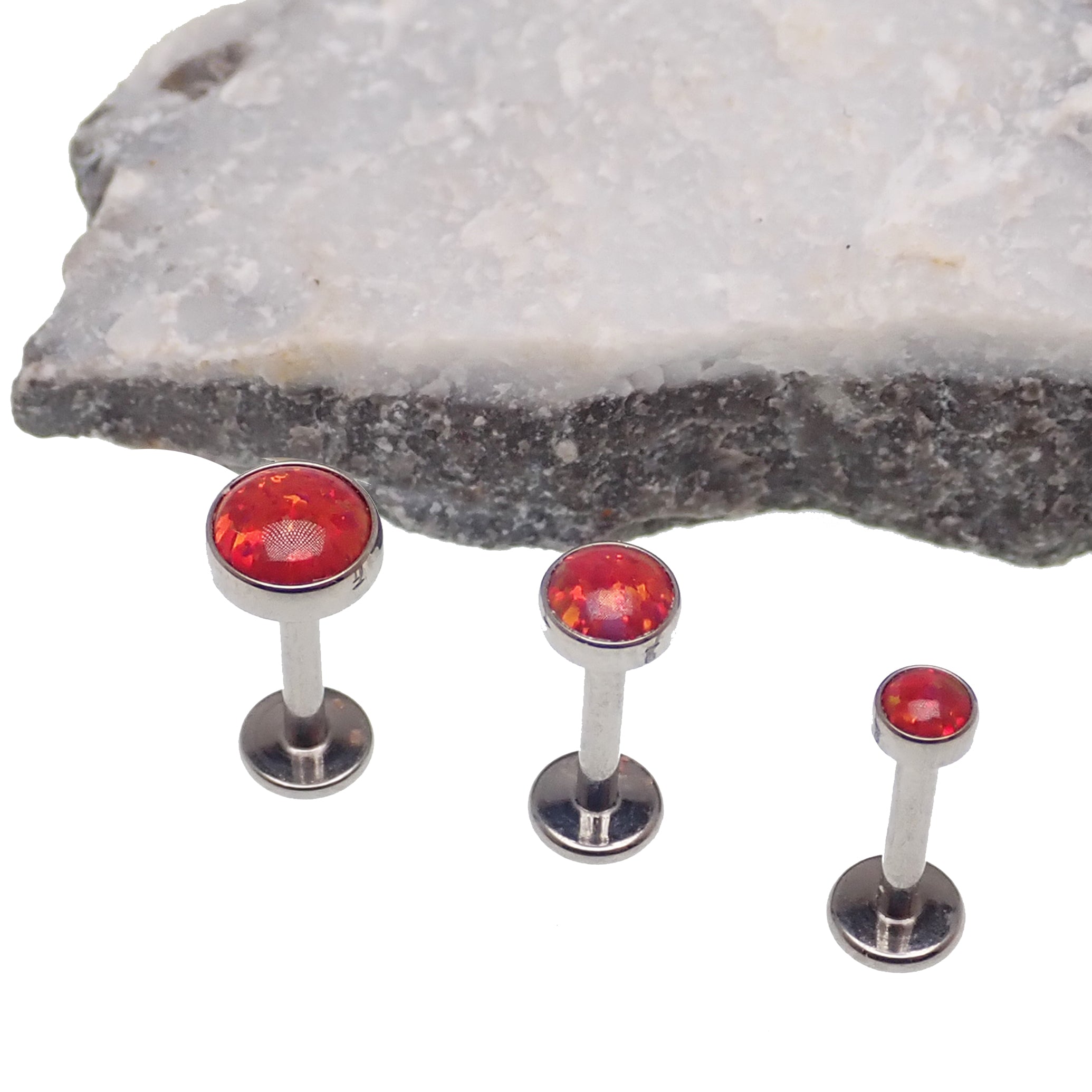 Fire Opal flat back piercing body jewelry by Body Clickers in 14g, 16g, & 18g with a 3mm or 6mm size, body jewelry.
