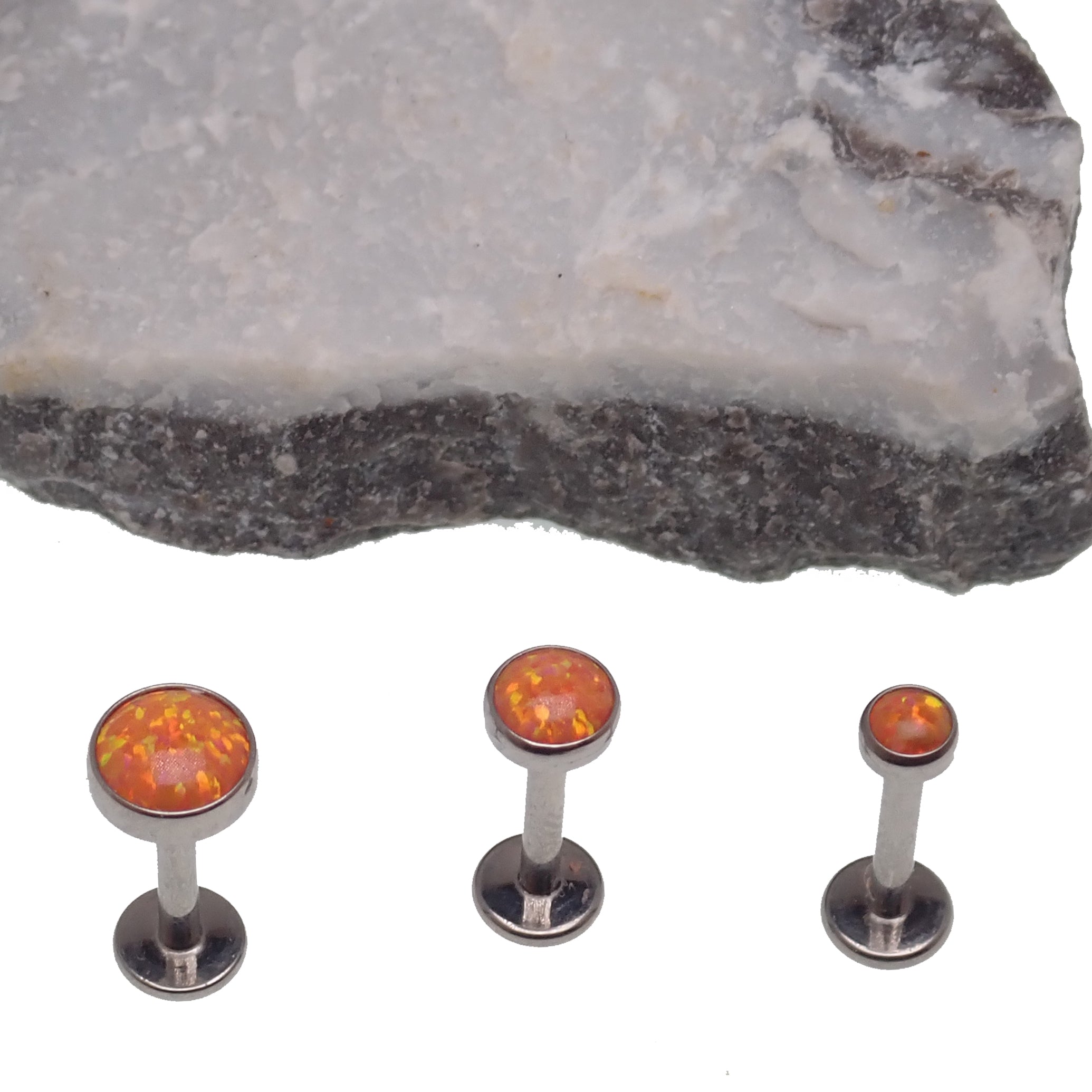 Orange Fire Opal flat back body piercing in 18g, 16g, and 14g gauges by Body Clickers, featuring a 3mm or 6mm gemstone.