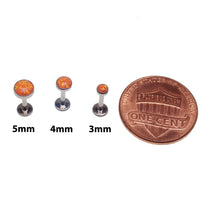 Orange Fire Opal flat back body piercing jewelry in 14g, 16g, and 18g by Body Clickers, featuring a 3mm or 6mm stone.