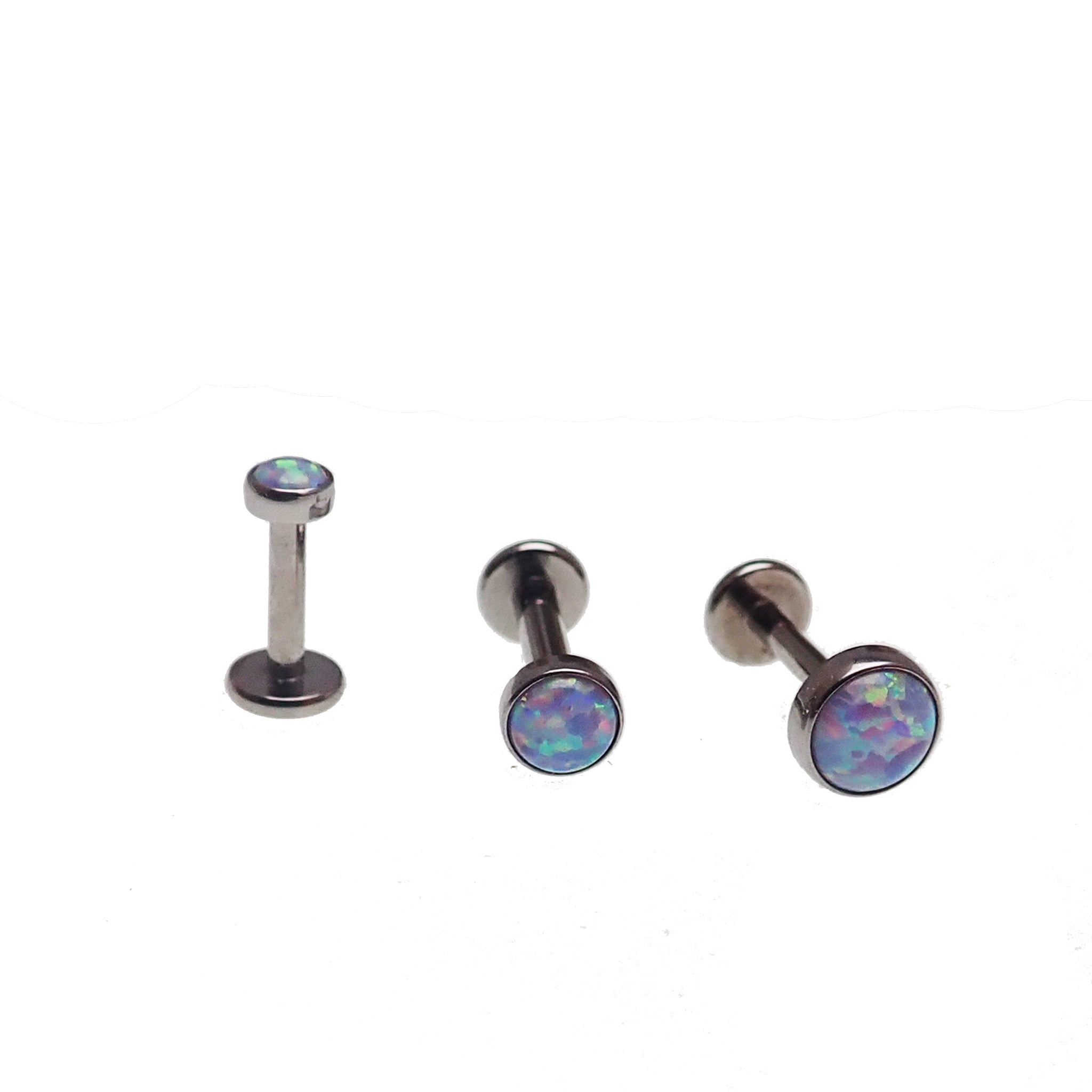 Unicorn opal flat back piercing in 14g, 16g, 18g, body jewelry by Body Clickers, showcasing the colorful gemstone and smooth metal finish.