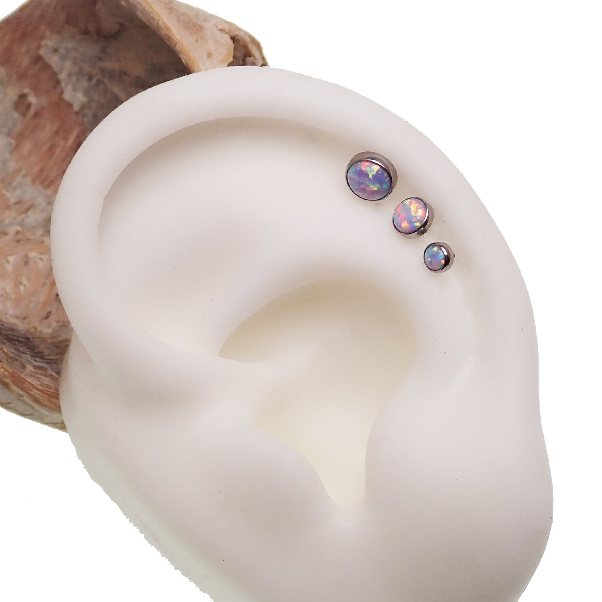 Unicorn opal flat back body piercing jewelry by Body Clickers in 14g, 16g, and 18g with colorful gemstone design.
