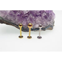 Internally threaded 16g plain flat back titanium ball body jewelry by Body Clickers, showing smooth, polished surface.