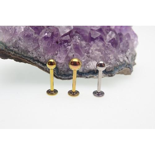 Internally threaded 16g plain flat back titanium ball body jewelry by Body Clickers, showing smooth, polished surface.
